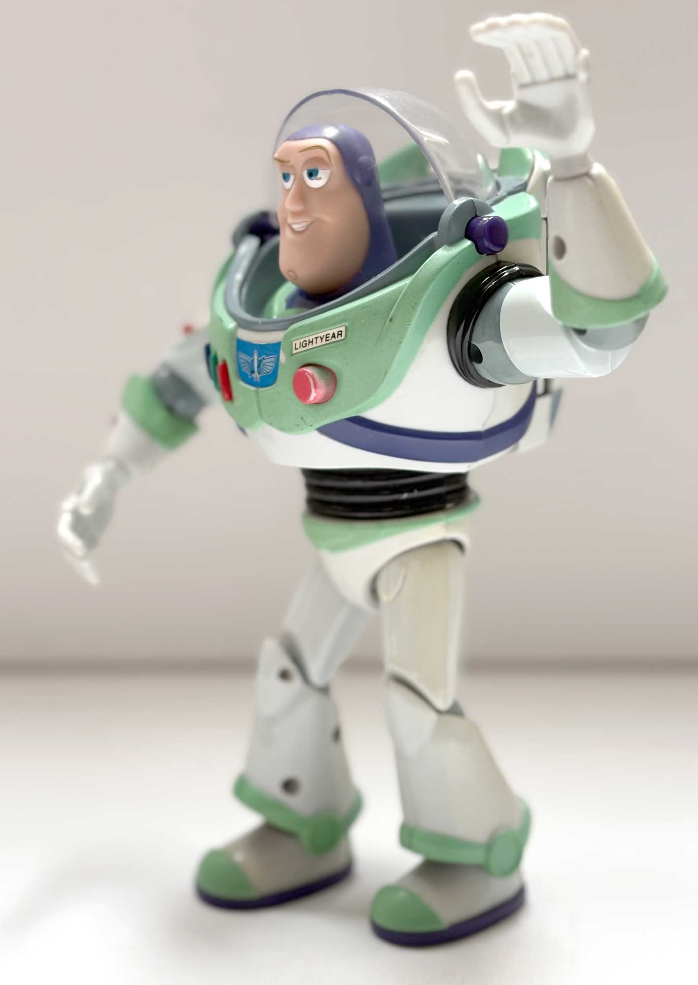 The same Buzz Lightyear from the side, showing the jetpack and the Lightyear nameplate